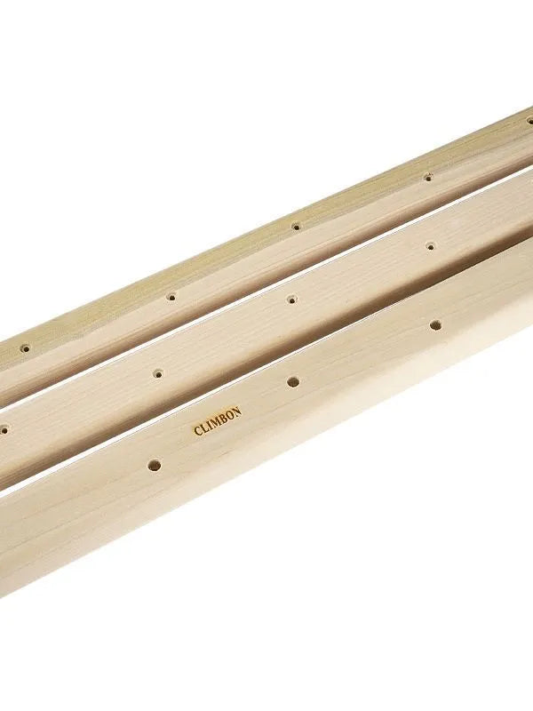 Wooden fingerboard hangboard set showing three different lengths for grip strength training