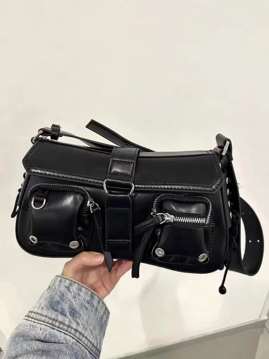 Black PU leather women's baguette messenger bag with adjustable strap and zippered internal compartment.
