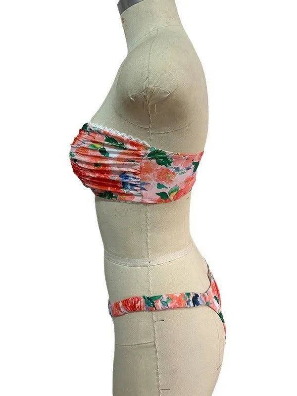 Floral print lace trim bikini top in blue, with matching short, shown on a mannequin.