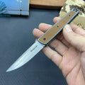 CRKT 7190 folding fruit knife showing blade and handle in choice of black, coffee brown, or red colours
