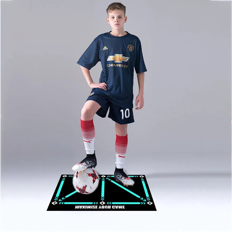 Black rectangular foam football training mat on a flat surface.
