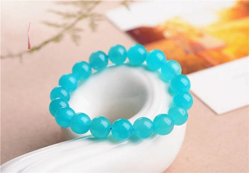 Grade 7A Amazonite scattered beads in ice colour with polishing treatment, showing natural gemstone variations