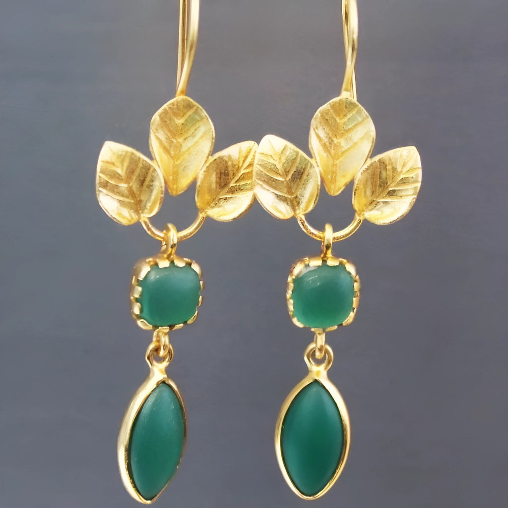 Gold-coloured copper earrings with French leaf design, tassel detailing, and water drop zircon pendant