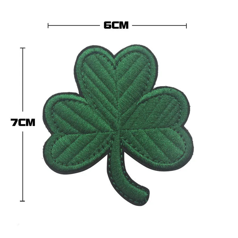 Embroidered fabric badge with Velcro backing in military green colour with tactical design