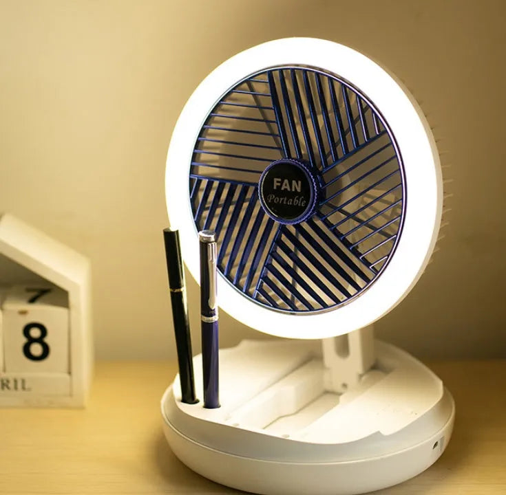 USB charging foldable table fan with LED light and 300-degree rotation on a desk
