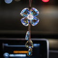 Crystal four leaf grass car pendant measuring around 20cm in transparent, champagne, translucent black finishes