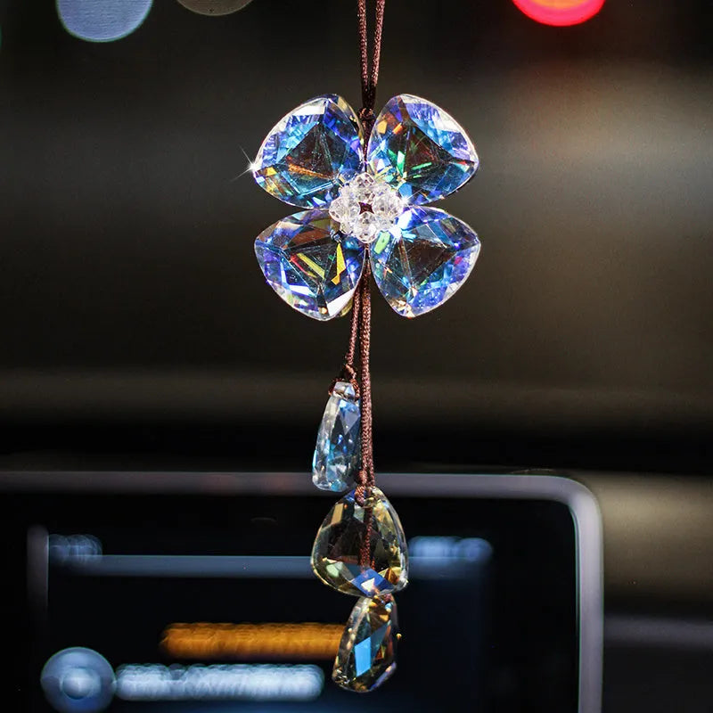 Crystal four leaf grass car pendant measuring around 20cm in transparent, champagne, translucent black finishes