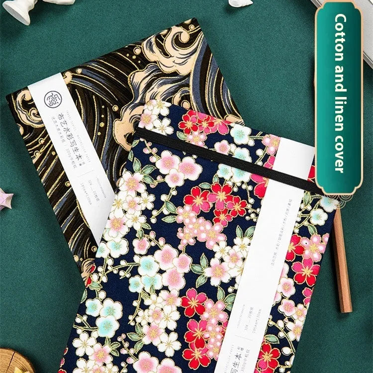 Feiluniao handmade fabric cover watercolour drawing book open on a page
