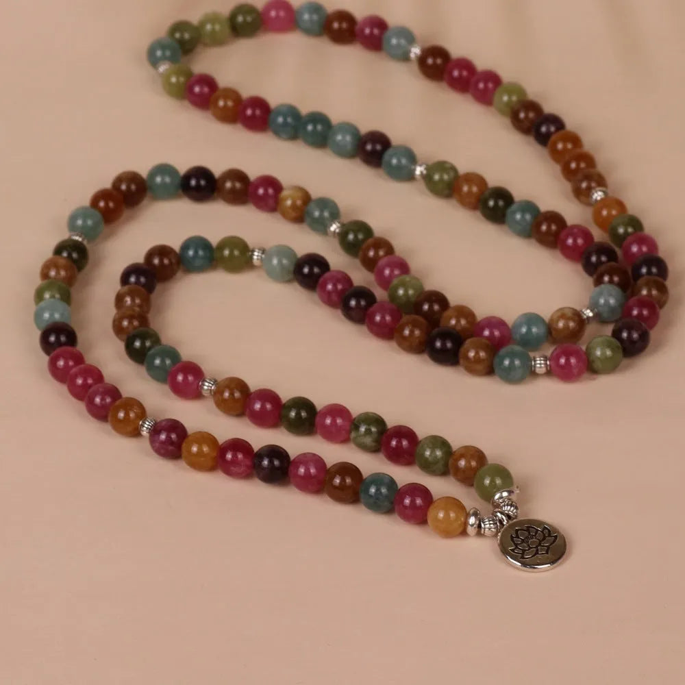 Multi-strand bracelet with 108 natural tourmaline beads and lotus charm on alloy chain