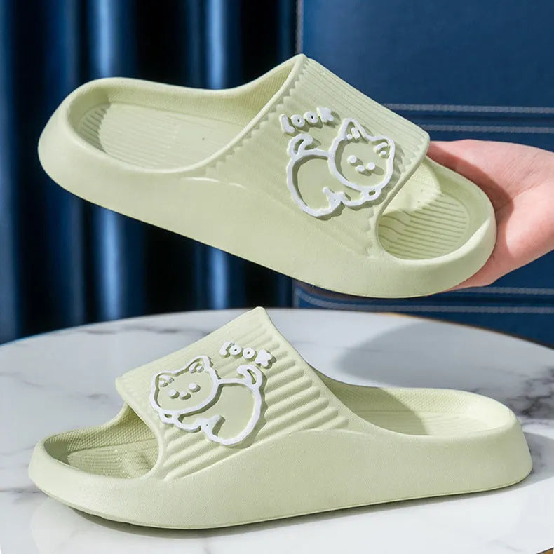 Women's green EVA flip-flop slippers with cute cat design and thick platform sole.