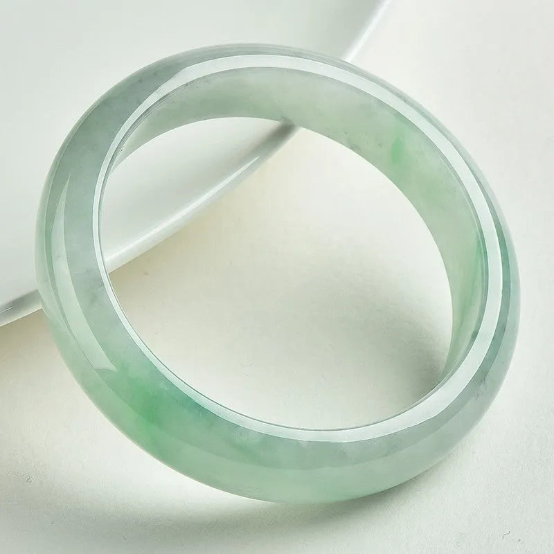 Natural jade bracelet light green colour unisex sizes 53 to 64
