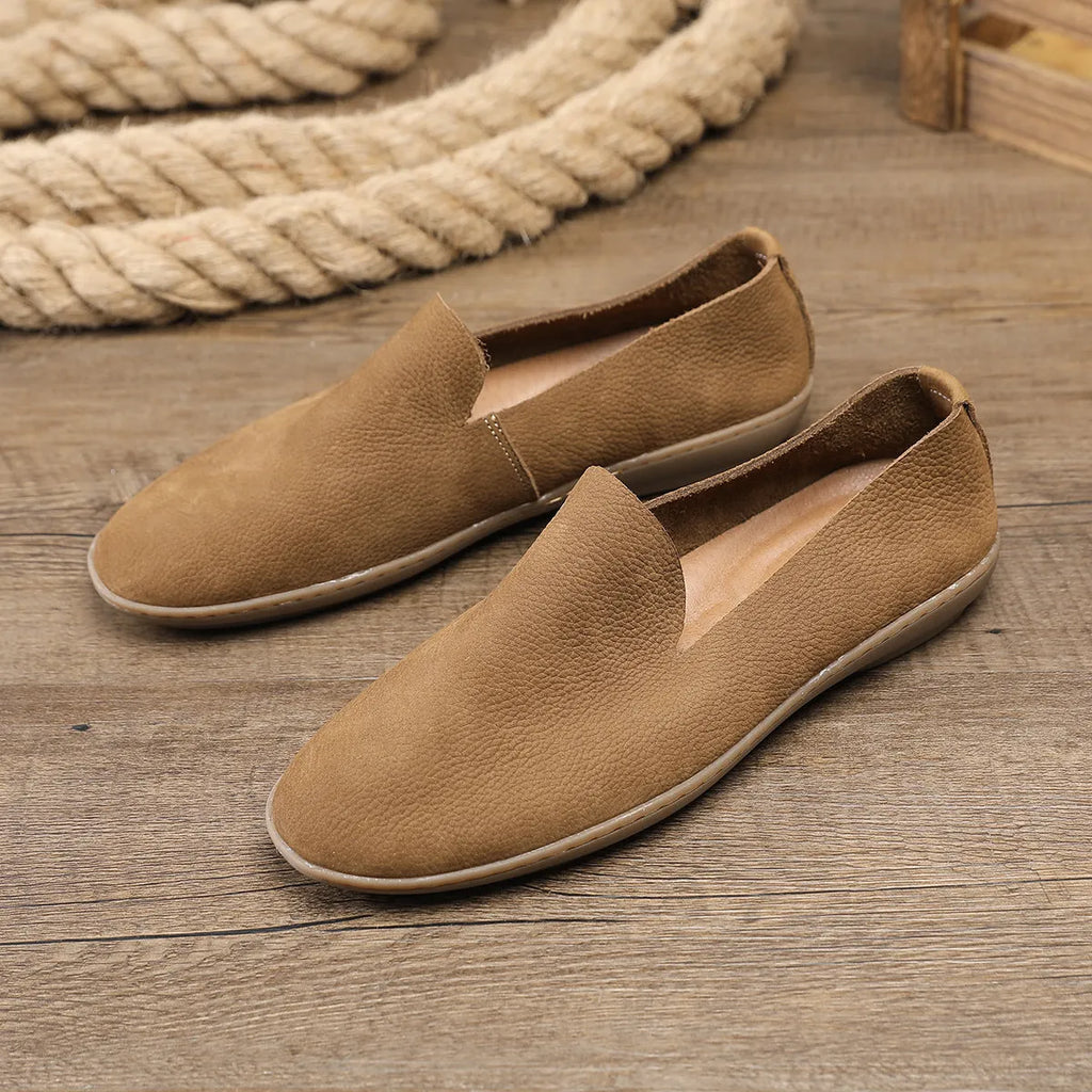 Handmade grey and khaki men's low-top casual sneakers with a cowhide upper and rubber wedge sole.