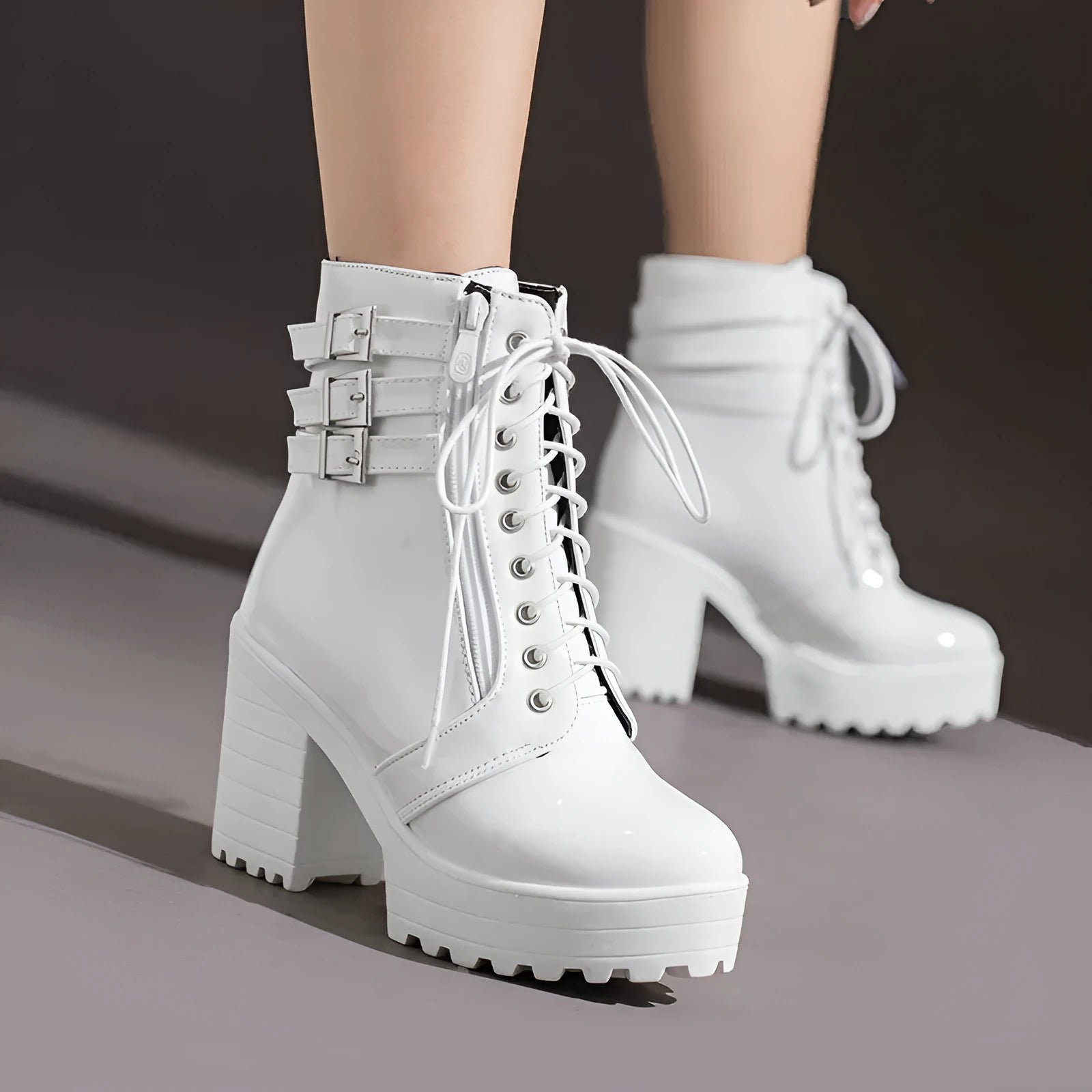 Women's black thick heel short boots with lace-up front and round toe design