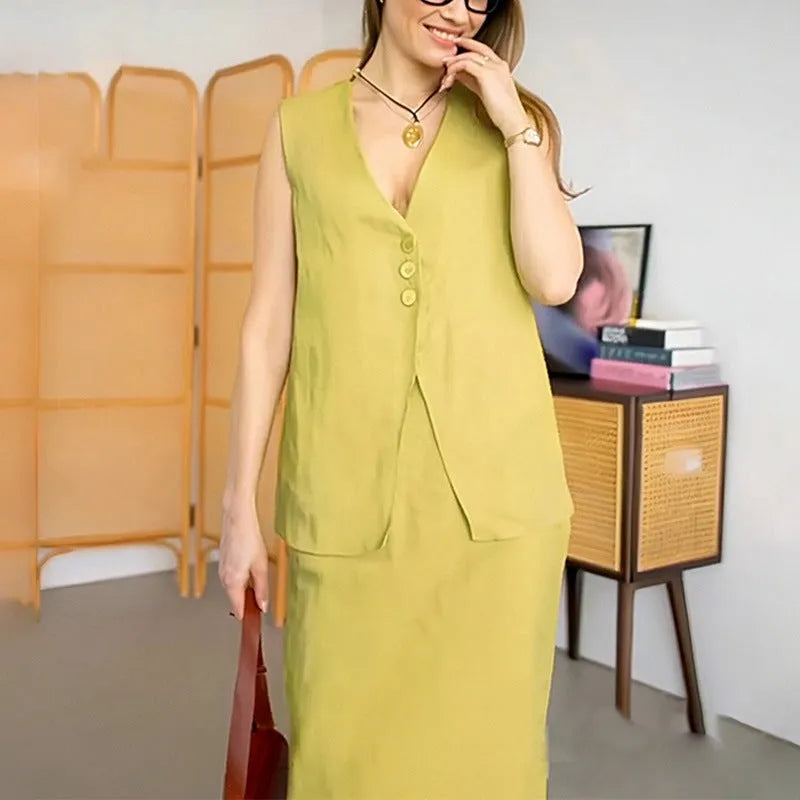 Casual white sleeveless vest and long skirt two-piece suit set on a hanger