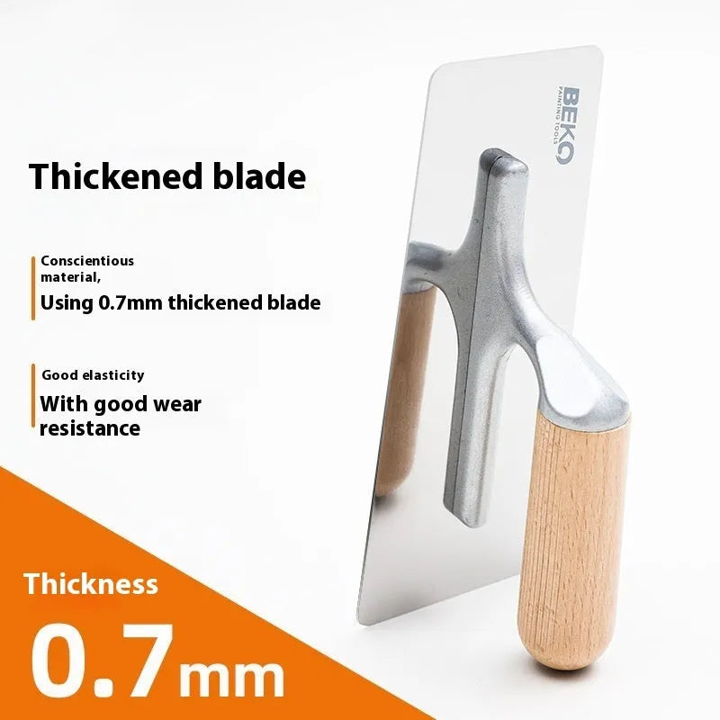 Stainless steel putty scraper with wooden handle for floor and wall preparation work