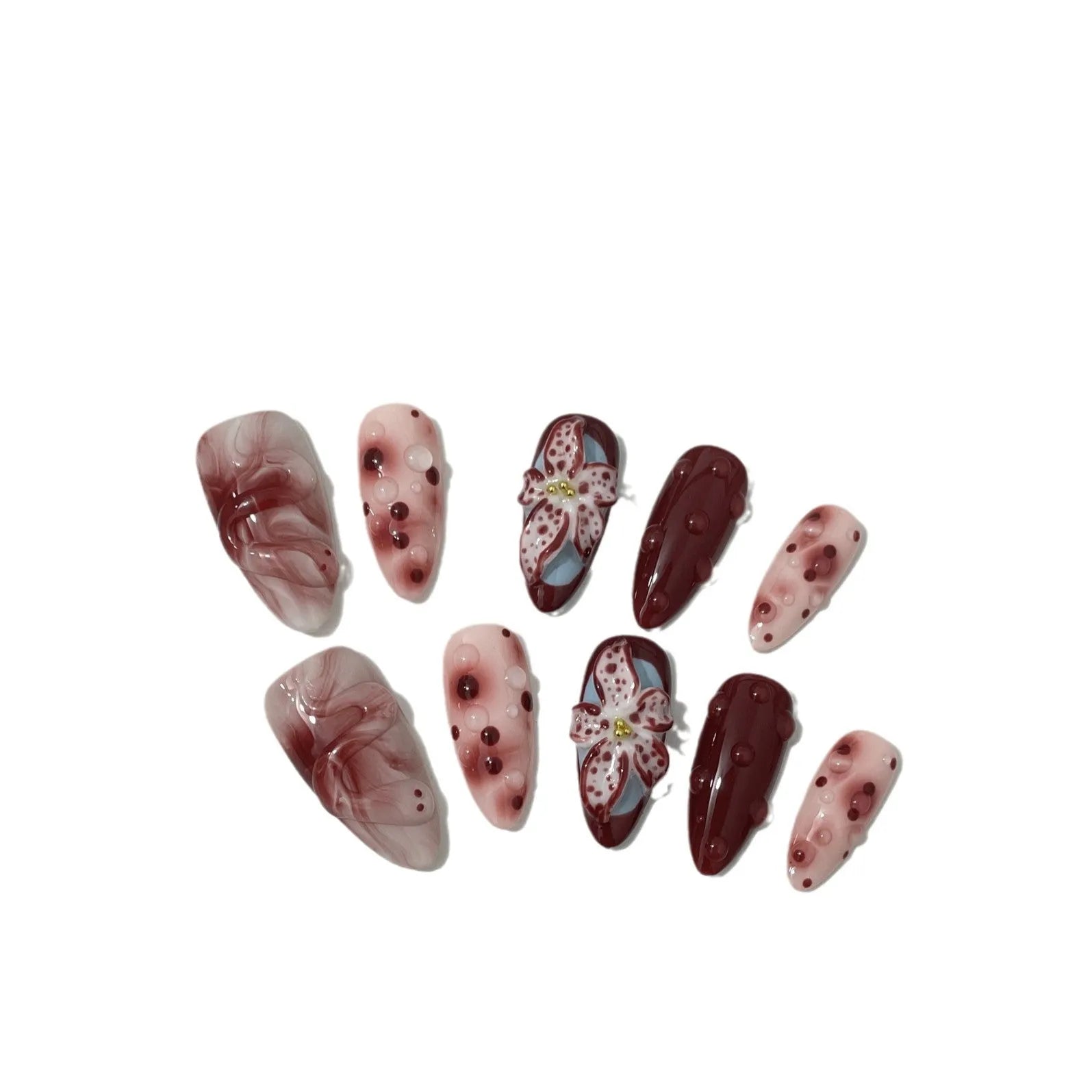 False nails with 3D carved floral and decorative patterns in almond shape, showing size options