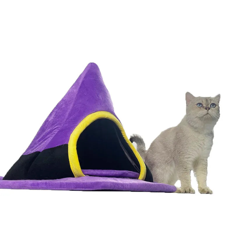 Purple witch hat shaped cat bed for Halloween, dimensions 60cm by 45cm.