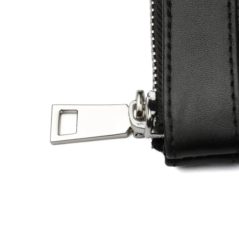 Men's black leather clutch wallet with 20x10cm dimensions and cowhide construction