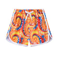 Children's polyester beach shorts in multiple colours and prints including pineapple, kitten, and solid designs