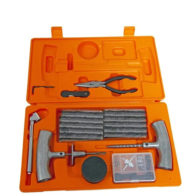 Emergency car tyre repair kit with tools and pressure gauge in compact storage case