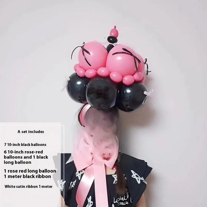 DIY finished balloon bouquet cake decoration kit with round balloons for party centrepieces.
