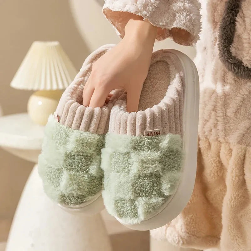 Women's plaid plush slippers in grey with a coral velvet upper and textured non-slip PVC sole.