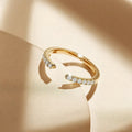 Silver adjustable geometry ring with electroplated platinum rehearsal diamond finish on finger