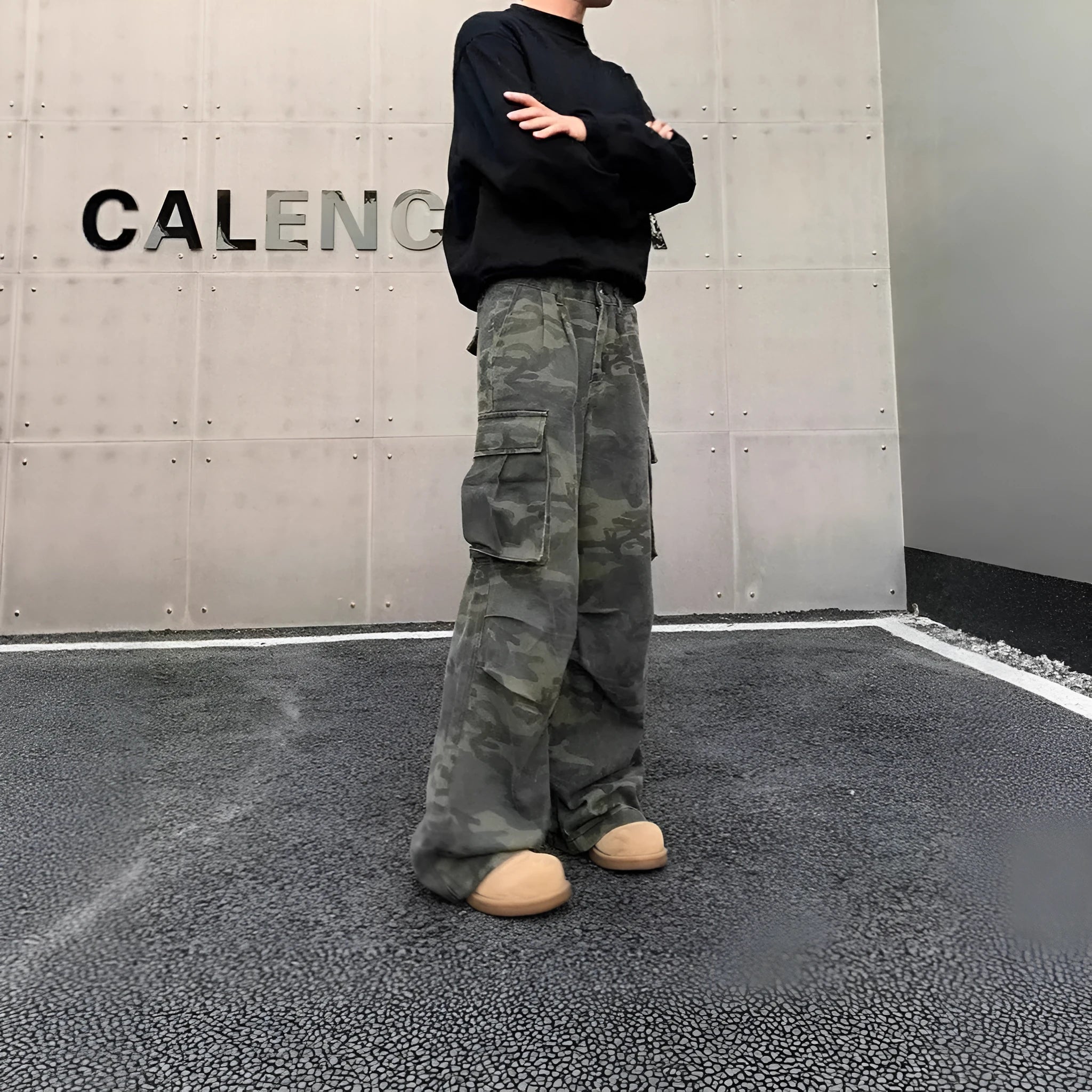 Korean-style washed camouflage cargo pants with multiple pockets on a mid-waist fit.