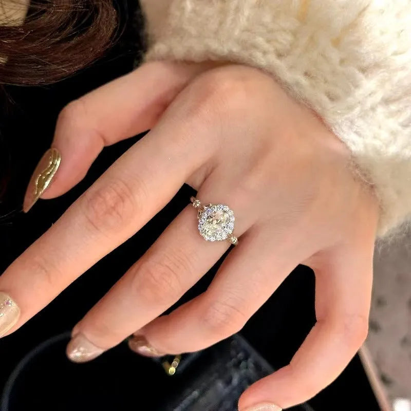 Silver adjustable geometric ring with diamond treatment and bridal bouquet design elements