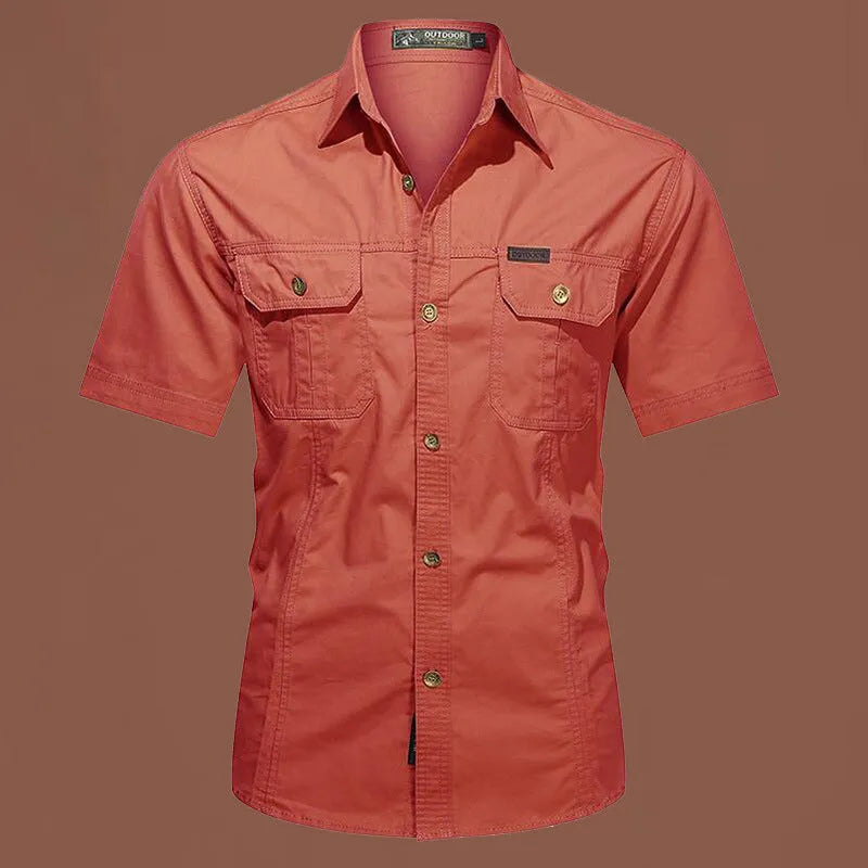 Men's short sleeve cotton work shirt in a loose fit, shown in a choice of colours including army green and blue.
