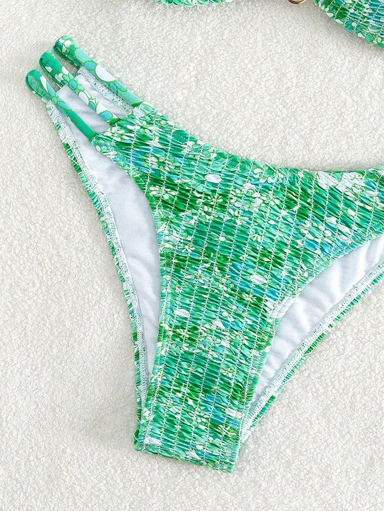 Women's floral bikini swimsuit in blue colour with high-waisted briefs style and nylon lining