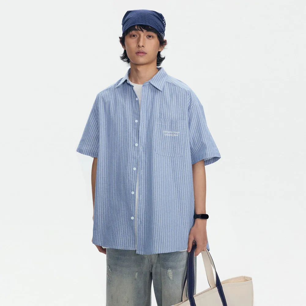 Blue striped overalls short-sleeved shirt for men and women, loose fit cardigan style, cotton blend fabric.