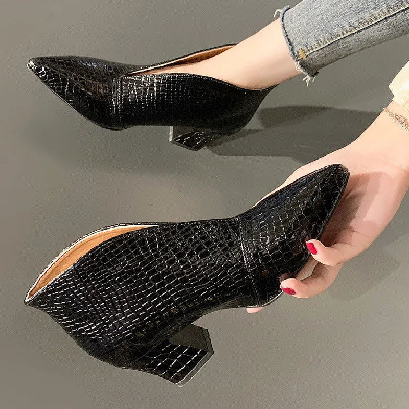 Women's V cut pointed embossed chunky heel Martin boots in artificial PU, black colour, low tube length