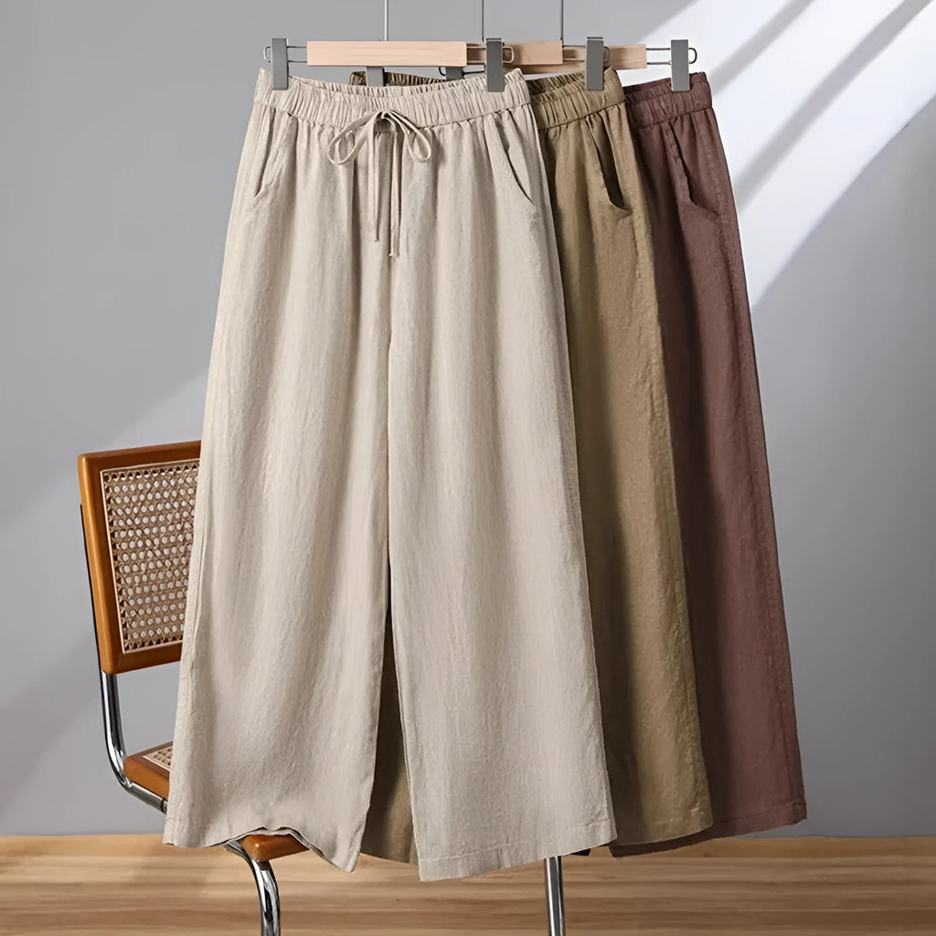 Women's straight-leg casual trousers with an elasticated drawstring waist in apricot colour