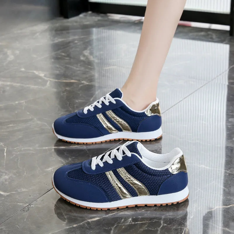 Blue women's casual tennis shoes with cross shoulder straps, round toe, and non-slip rubber soles