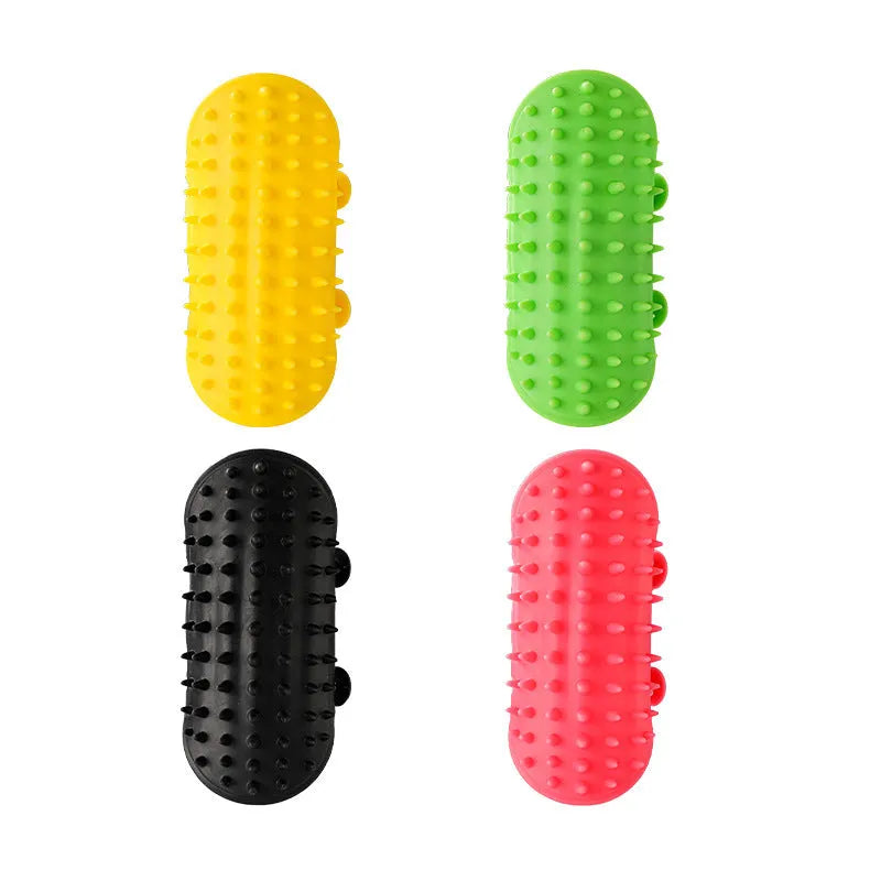 Silicone cat grooming comb with adjustable strap mounted on a table leg