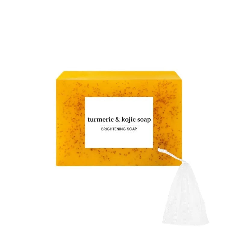 Facial care kit with turmeric cleansing mousse 490g, facial cleaning pads, and ginger granule soap on white background