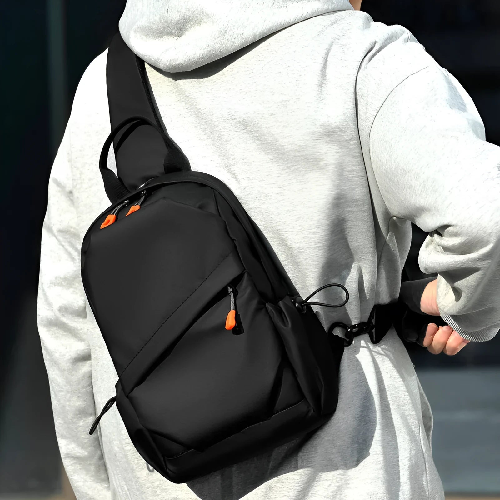 Men's black waterproof polyester crossbody bag with simple casual design