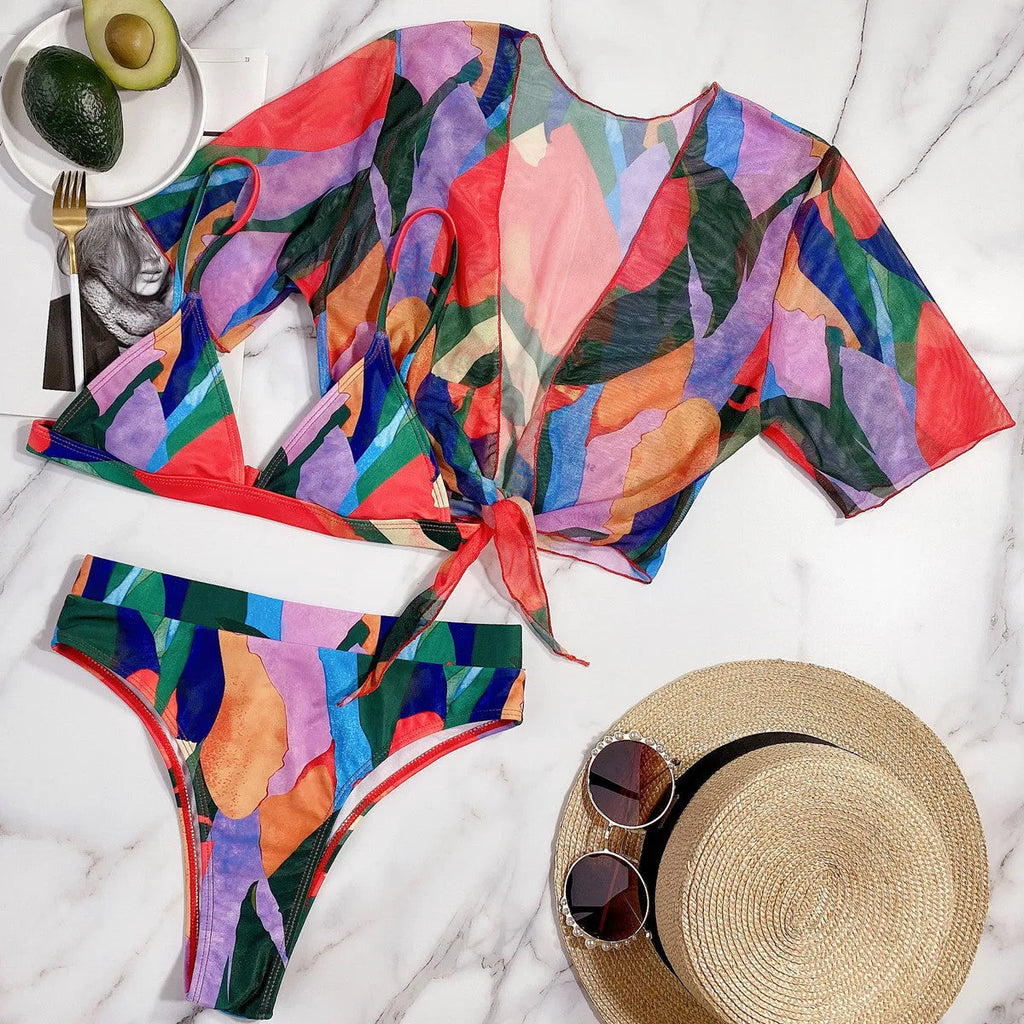 Red printed women's split swimsuit in nylon fabric for swimming.