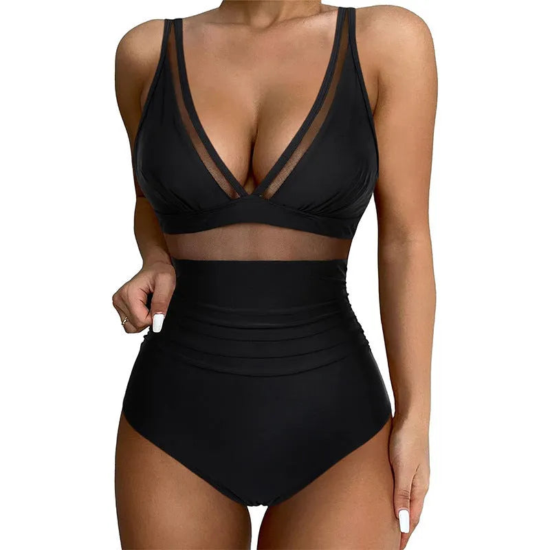 Black women's one-piece swimsuit with halter neck and mesh panel detailing.