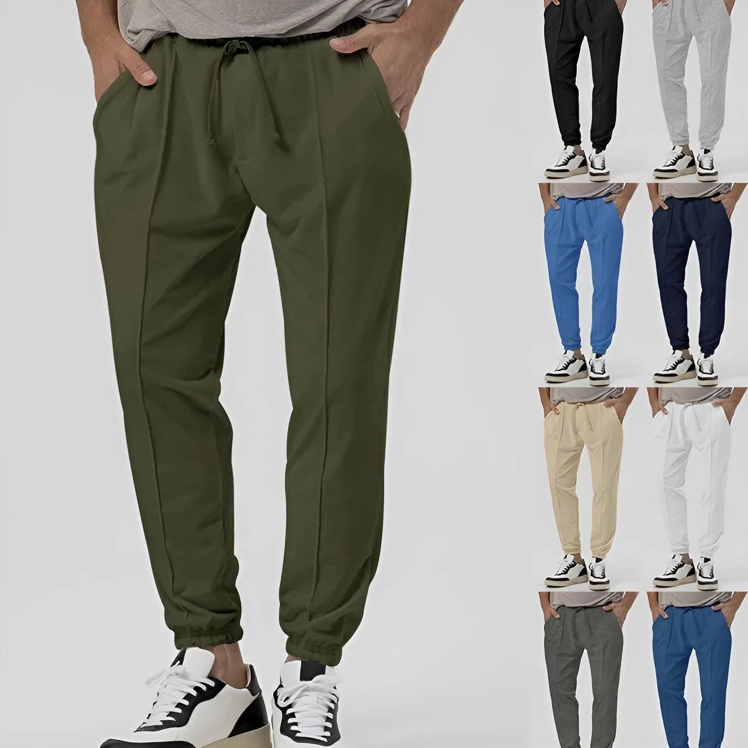 Men's grey cotton blend track sweatpants with elastic waistband and straight-leg tapered design