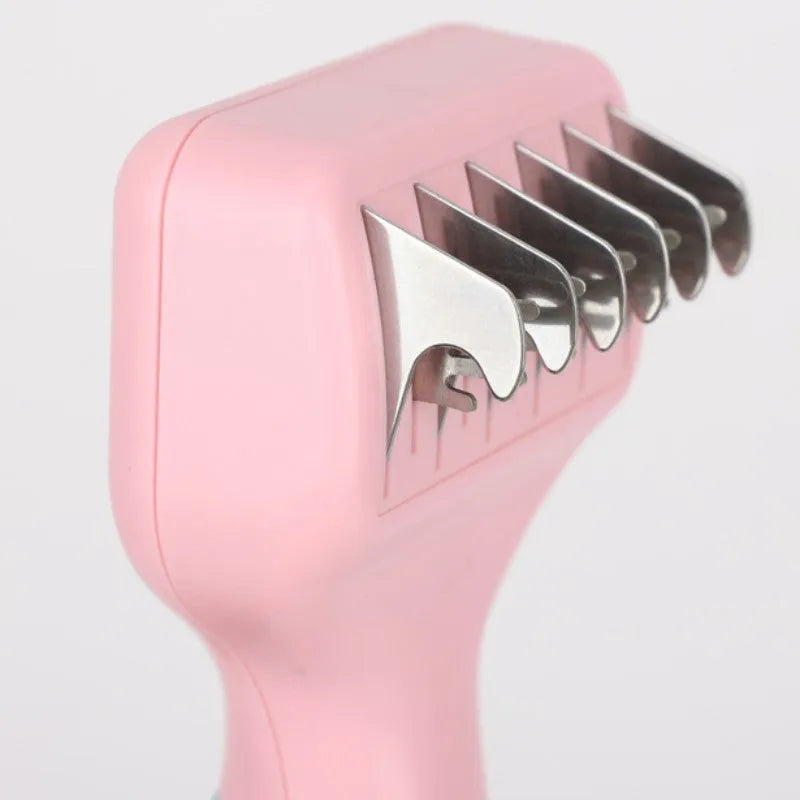 Pink stainless steel pet comb with integrated knot knife for grooming dogs and cats.