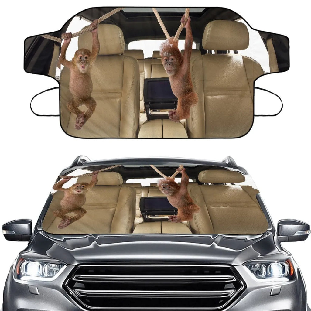 Car front gear snow protection cover showing aluminium film material and lanyard ties for windscreen.