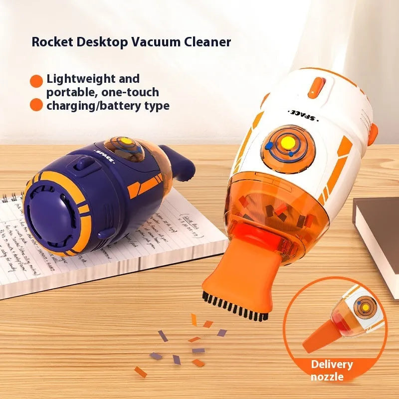 Blue USB rechargeable handheld desktop vacuum cleaner on a wooden desk next to a keyboard.