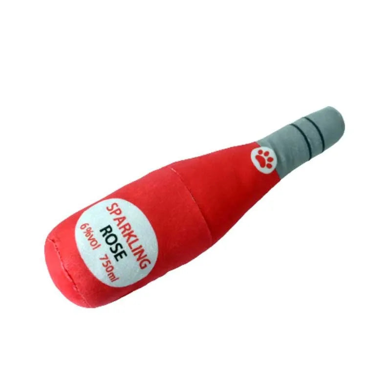 Soft green plush wine bottle dog toy with squeaker for play enrichment.