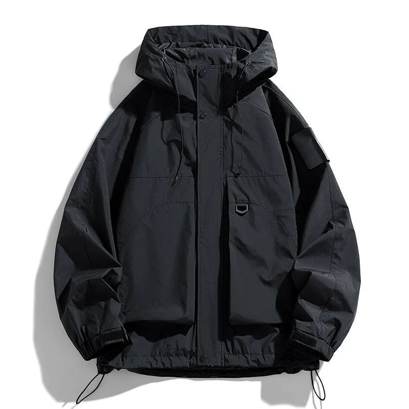 Men's black hooded waterproof windproof jacket with long sleeves, shown on a model.