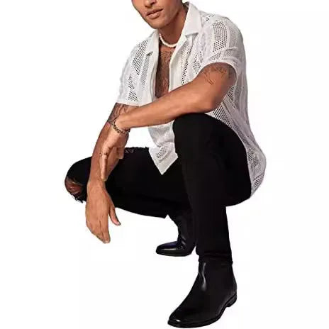 Man wearing a black knitted short-sleeved button cardigan shirt with jacquard detailing.