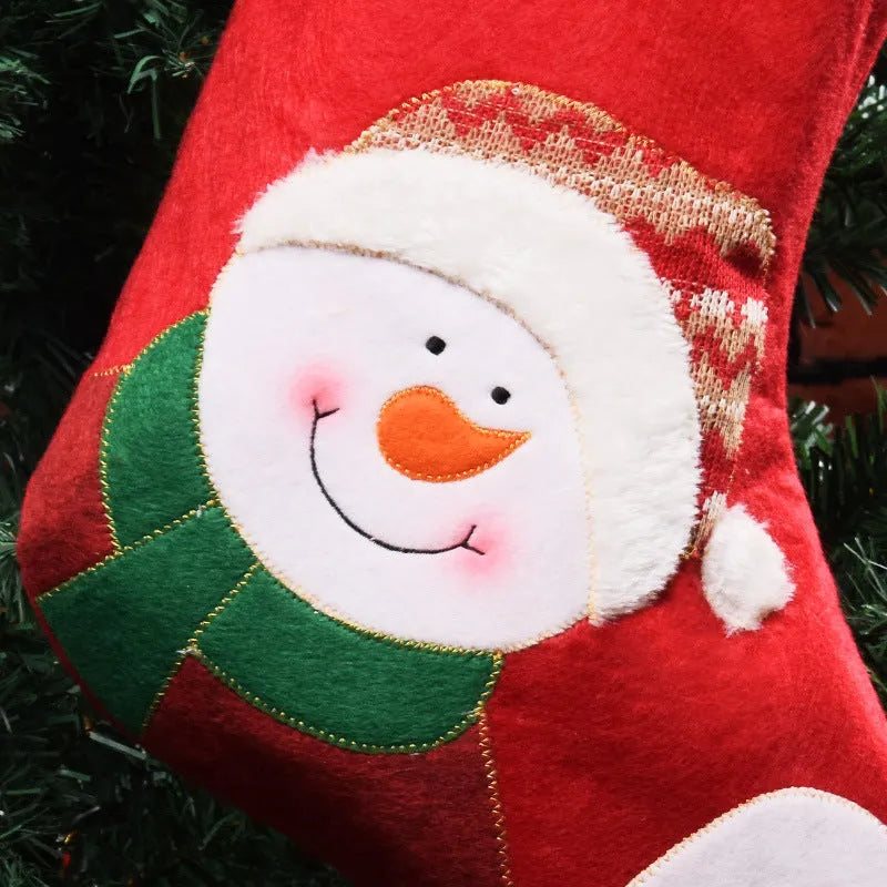 Christmas stockings in elk, elderly gentleman and snowman designs made from non-woven fabric