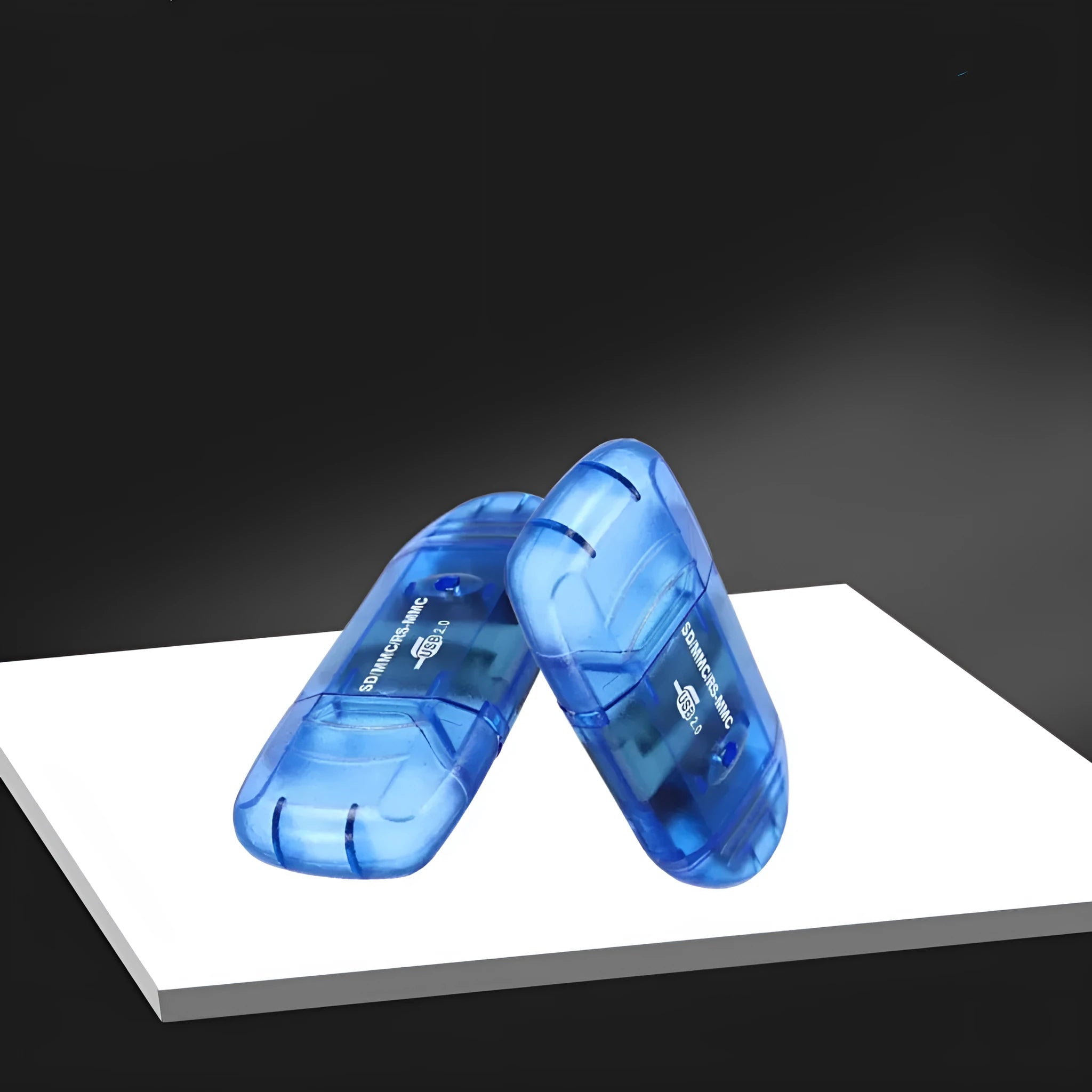 Transparent plastic USB card reader with a clear housing showing internal components.