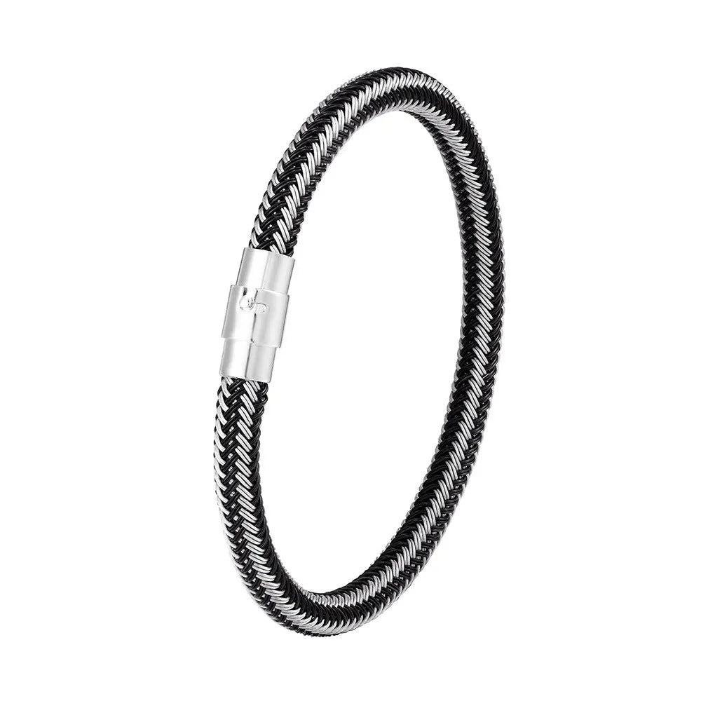 Geometric titanium steel bracelet with magnetic clasp shown in a unisex style on a wrist.